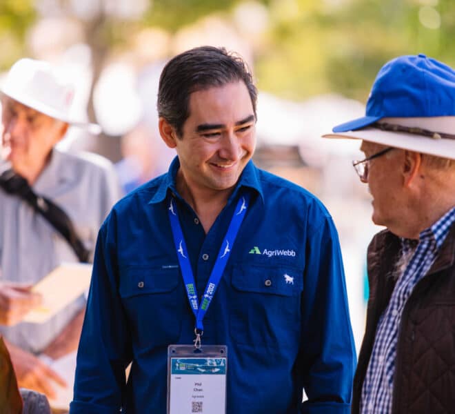 talking to ranchers at convention