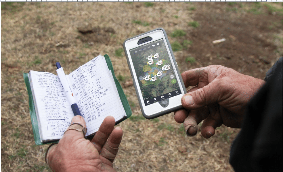 notebook and mobile app side by side